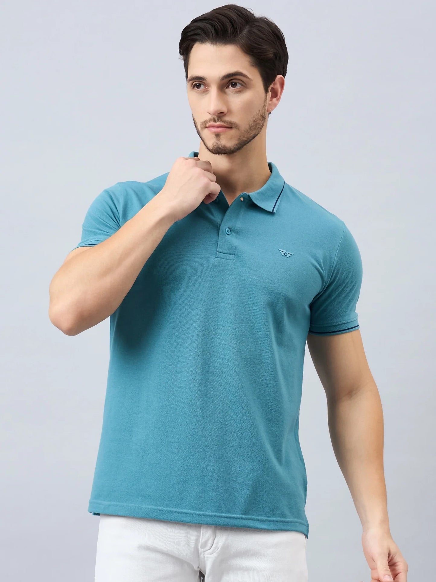 Men Green Solid Cotton Polos