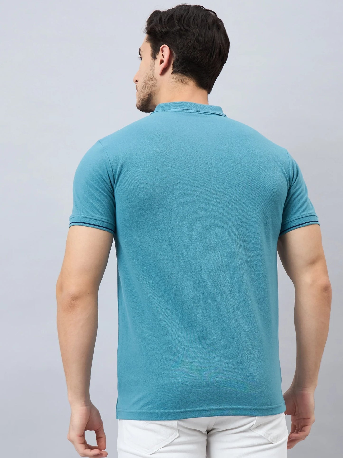 Men Green Solid Cotton Polos