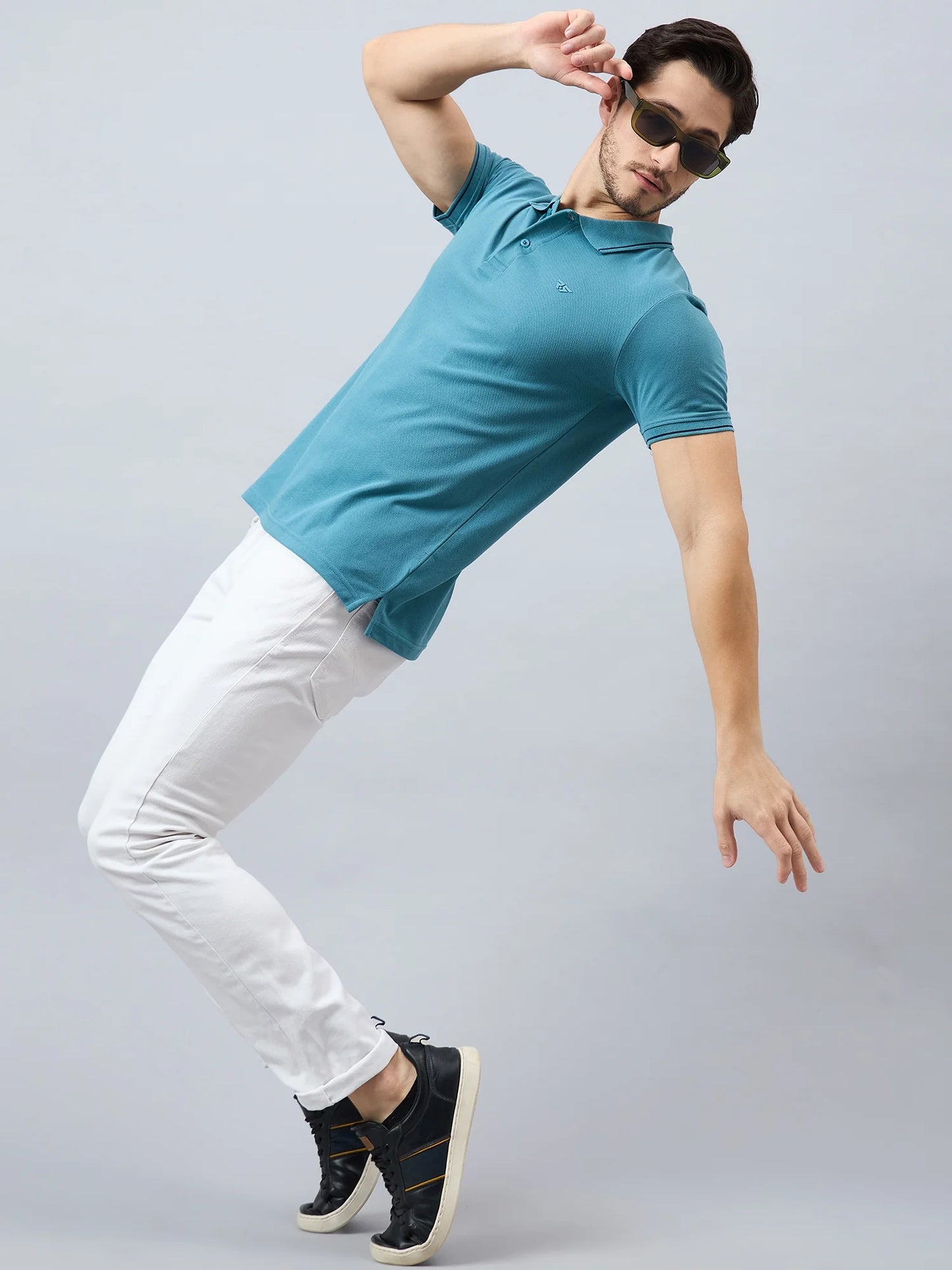 Men Green Solid Cotton Polos